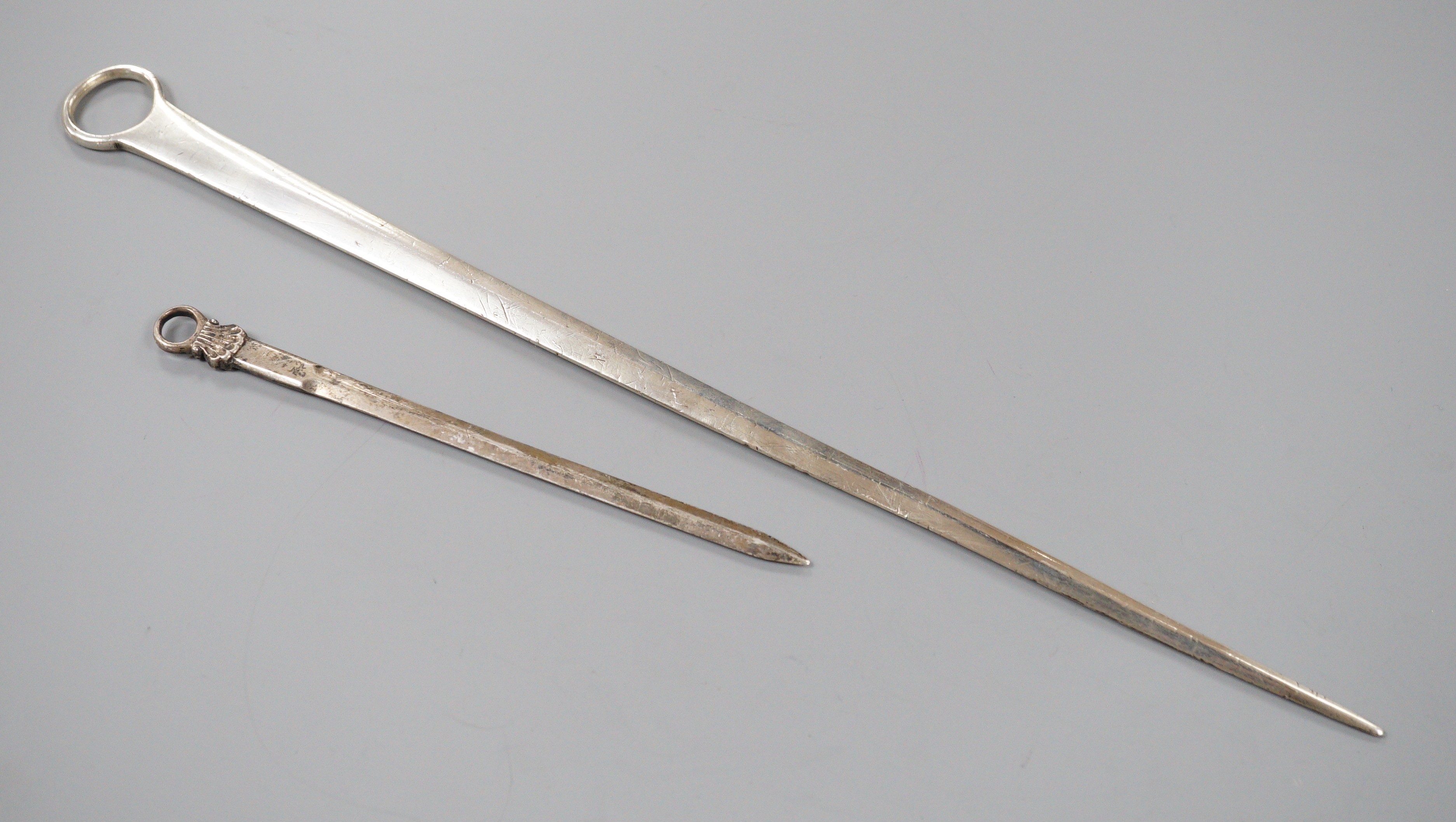 A George III silver meat skewer, Smith & Fearn, London, 1787, 32.7cm, together with a later game skewer, Eley, Fearn & Chawner, London, 1808.
